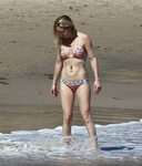 brian switzer add kate mckinnon bikini photo