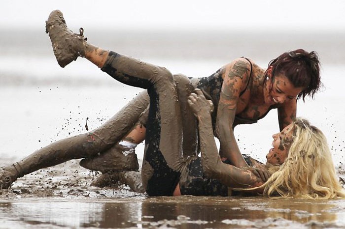 ashton keith add naked women mud wrestling photo