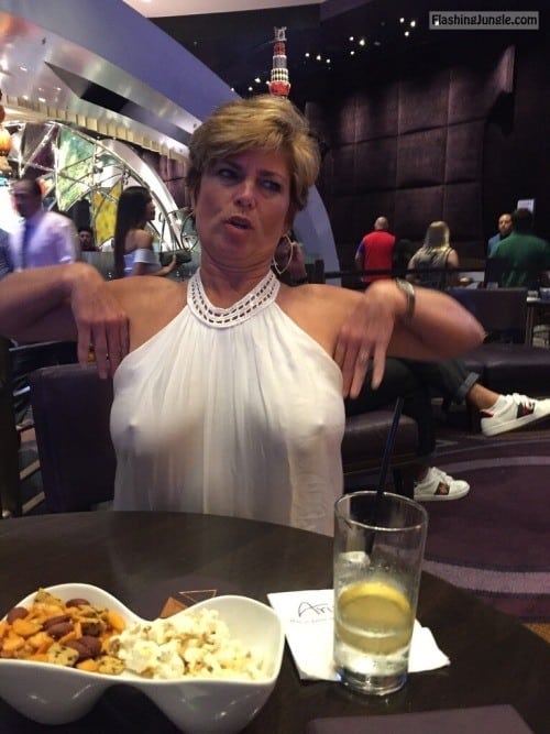 christine rousseau add flashing at restaurant image