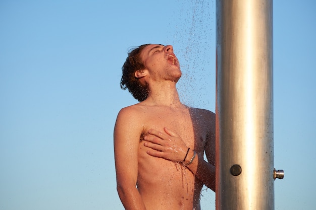 brandon cavin add naked beach shower photo